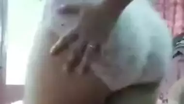 Desi camgirl with glasses undresses performing a dance in XXX show